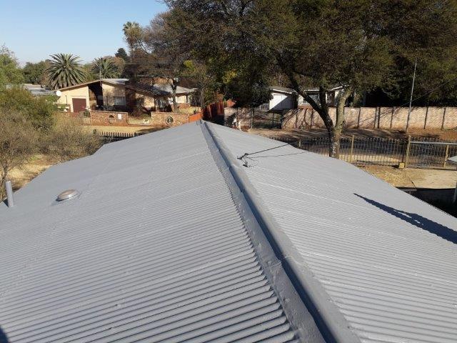 Roof sheeting restoration and painting
